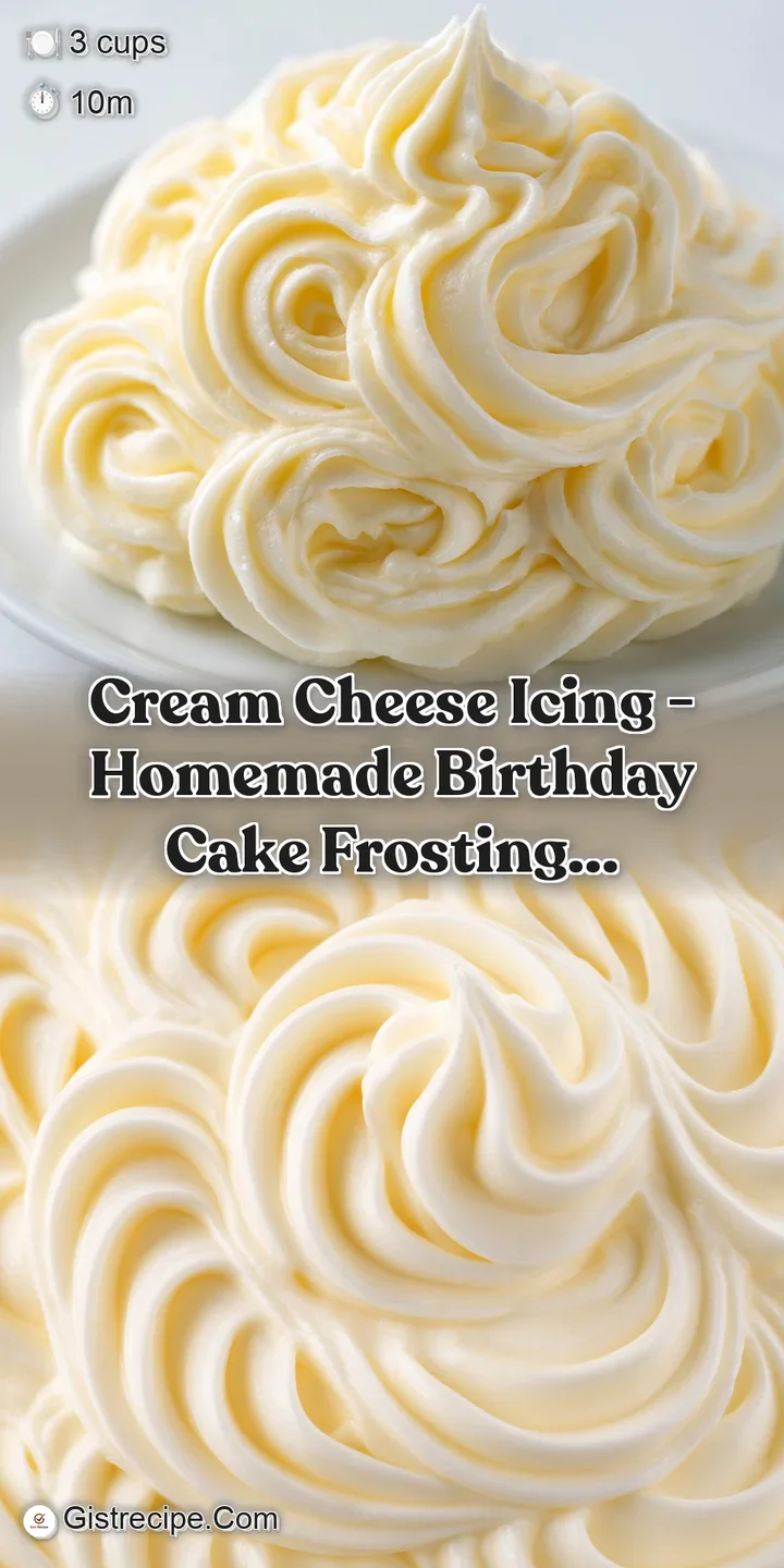 Close-up of a thick, creamy white dollop of icing showing soft peaks and a smooth, glossy, buttery texture.