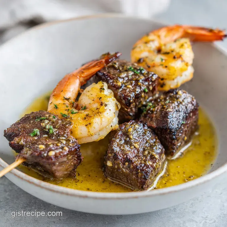 Neatly arranged grilled skewers on a white ceramic plate, garnished with fresh parsley and a side of creamy sauce.